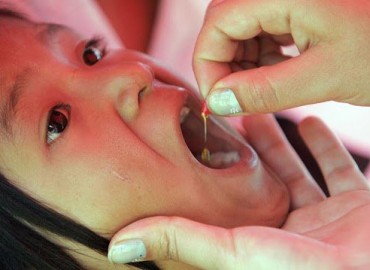 Children being administered vitamin ‘A’
