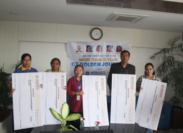 Jyoti Bikash Bank honors employees with more than 15 years of service.