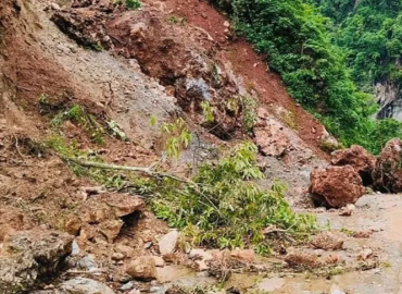 Dry landslide obstructs two highways