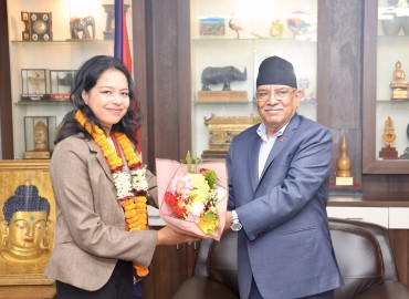 Chairman Prachanda recognizing and honoring medalist Govardhan