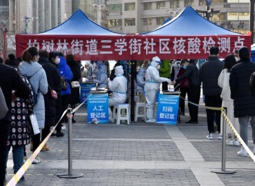 COVID-19 cases have more than doubled in China’s growing outbreak